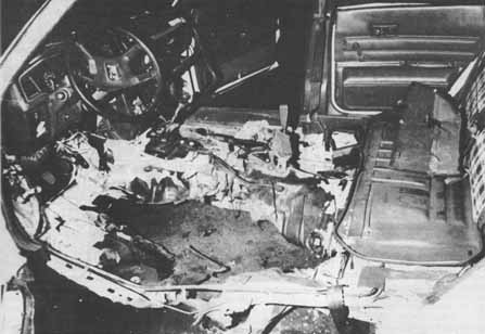 Police photo of Judi Bari's bombed car proves the bomb was hidden under her driver's seat, not in plain view on the back seat floor as FBI claimed.